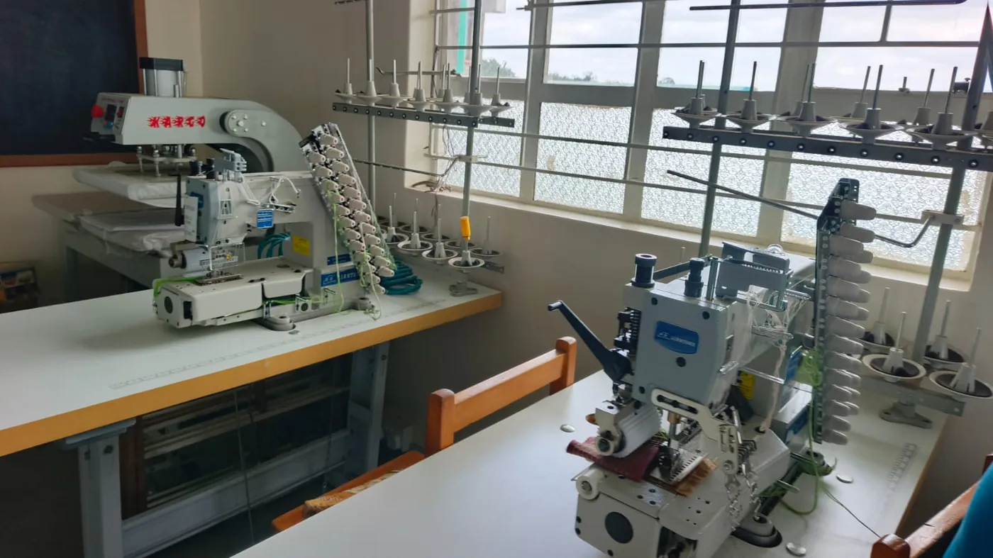 Industrial overlock sewing machines in the fashion workshop