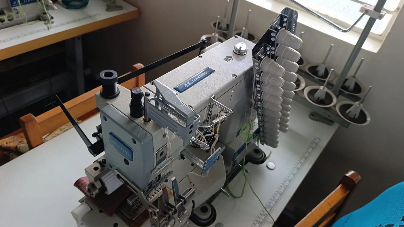 A specialised industrial sewing machine in the fashion classroom