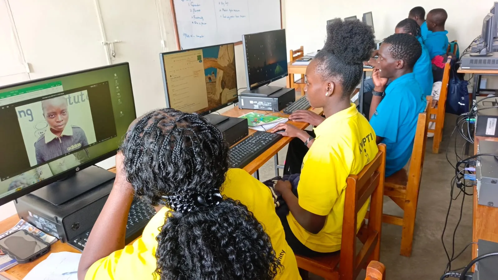 KWPTI IT students learning with desktop computers