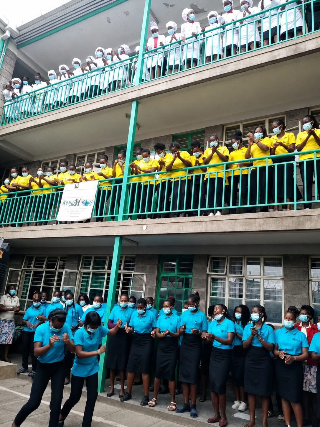 KWPTI students gathered across the institute's campus balconies